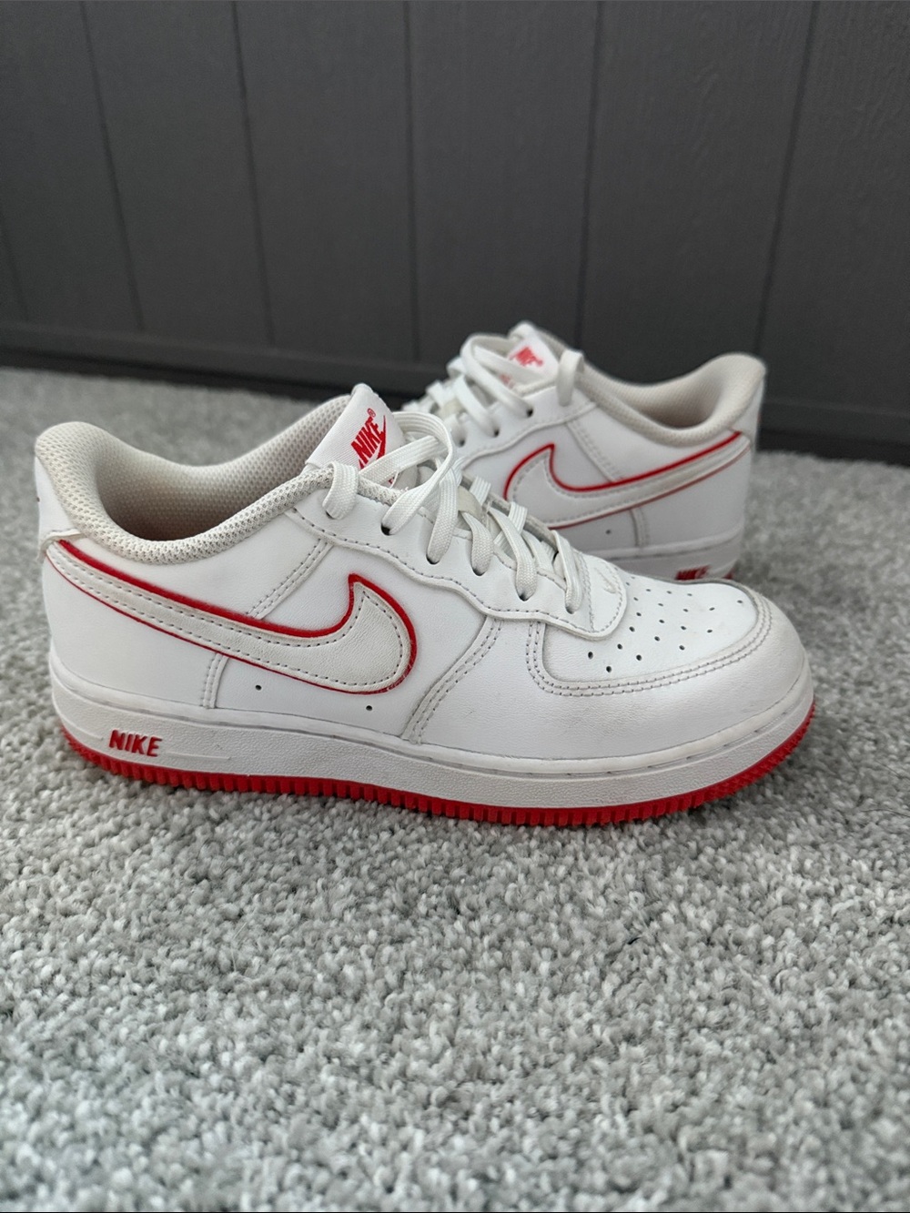 Nike Kids White Sneakers with Red Accents
